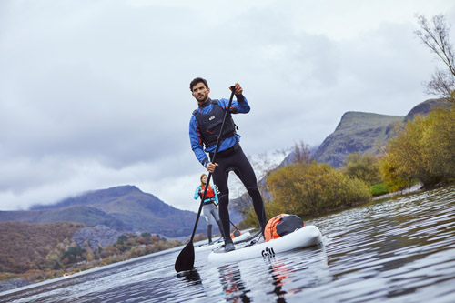 Man out on the water Paddle Boarding Man out on the water Paddle Boarding