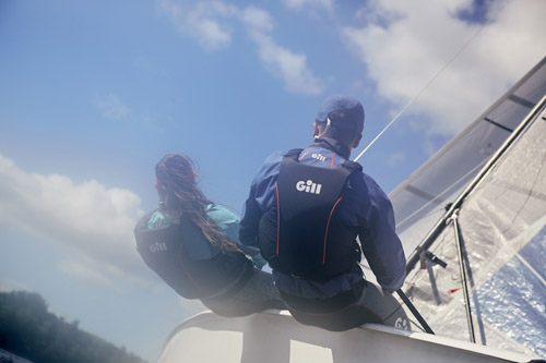 Man & Woman out on the water Dinghy Sailing Man & Woman out on the water Dinghy Sailing